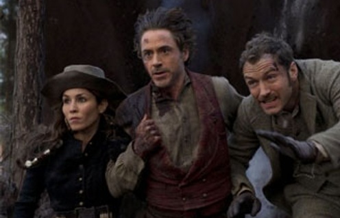 Jude Law, Robert Downey Jr. et Noomi Rapace dans le film Sherlock Holmes: A Game of Shadows.